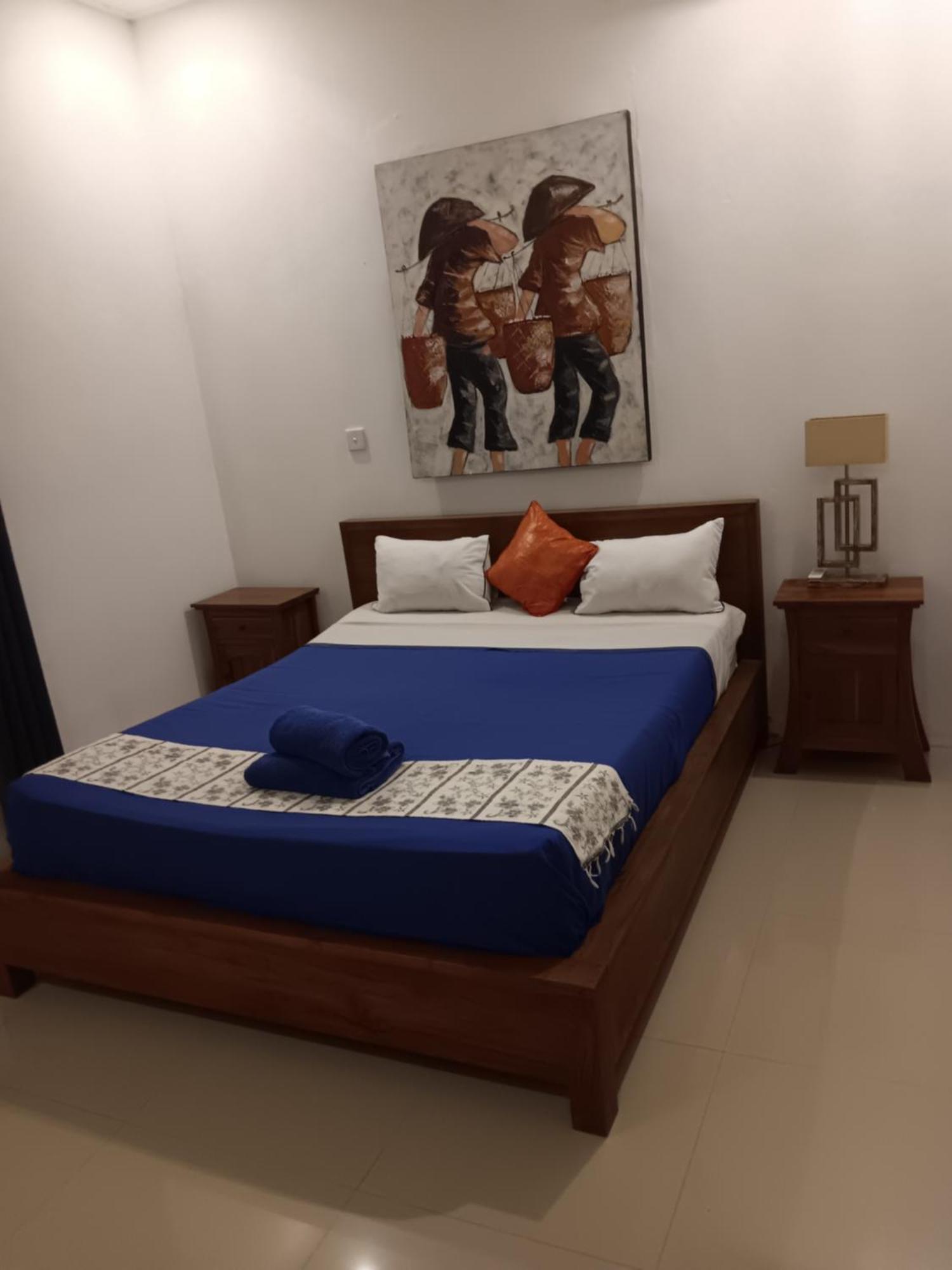 Adore Guesthouse Amed Habitación foto