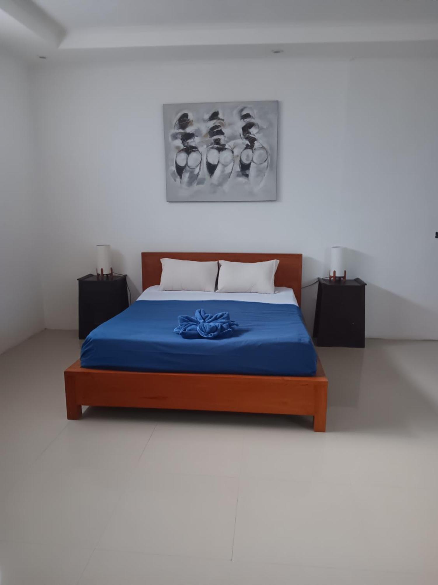 Adore Guesthouse Amed Habitación foto